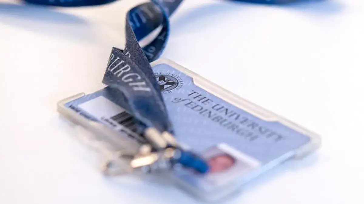 Image of a University of Edinburgh card and lanyard on a white table