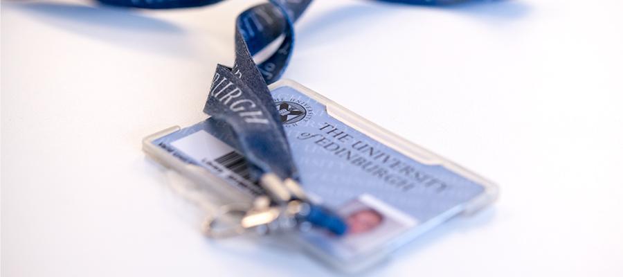 Image of a University of Edinburgh card and lanyard on a white table